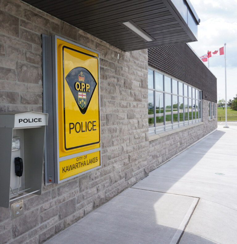 Built in 2015 by the Province of Ontario, the Kawartha Lakes OPP Detachment in Lindsay came at no direct cost to local taxpayers. The Province funds all capital costs for the OPP, including the $9 million cost of this 11-year-old facility next to the Ontario government building and Lindsay courthouse. Image from Infrastructure Ontario.