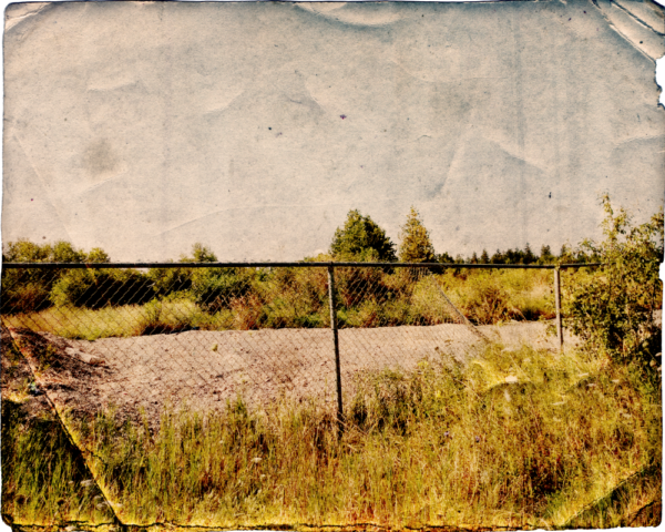 Just beyond this fence and below the ground was once an underground rifle range measuring 1,800 feet in length. Photo: Ian McKechnie.
