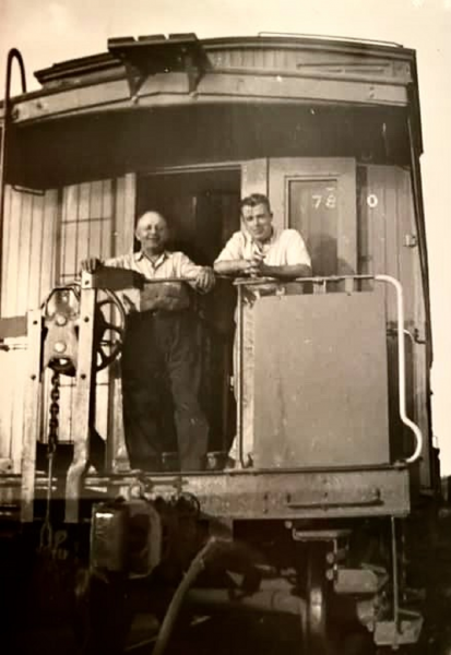 Conductor Harold Hawkins (left) and brakeman Weston Reid (right) pose on C.N.R. caboose no. 78770 in Danforth Yard (Toronto) after bringing a freight train down from Lindsay, 1958. Image courtesy Jason Whiteley.