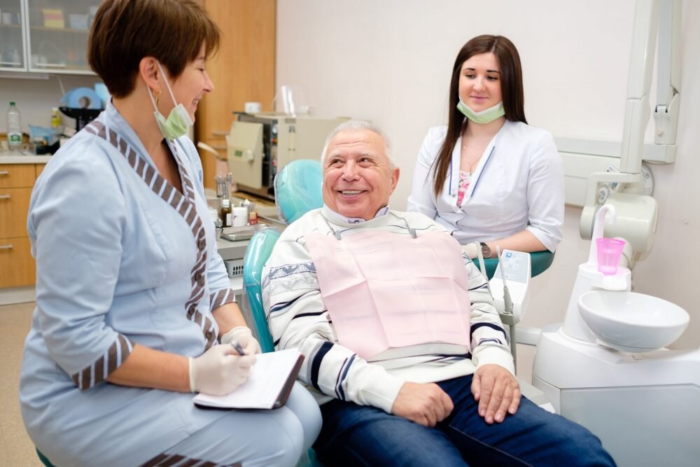 Seniors smiling after new dental care program covers most denture costs