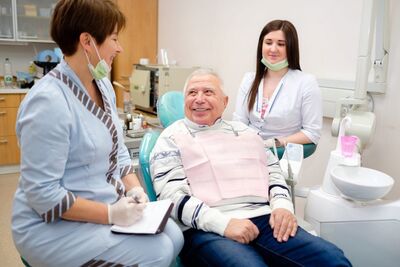Seniors smiling after new dental care program covers most denture costs