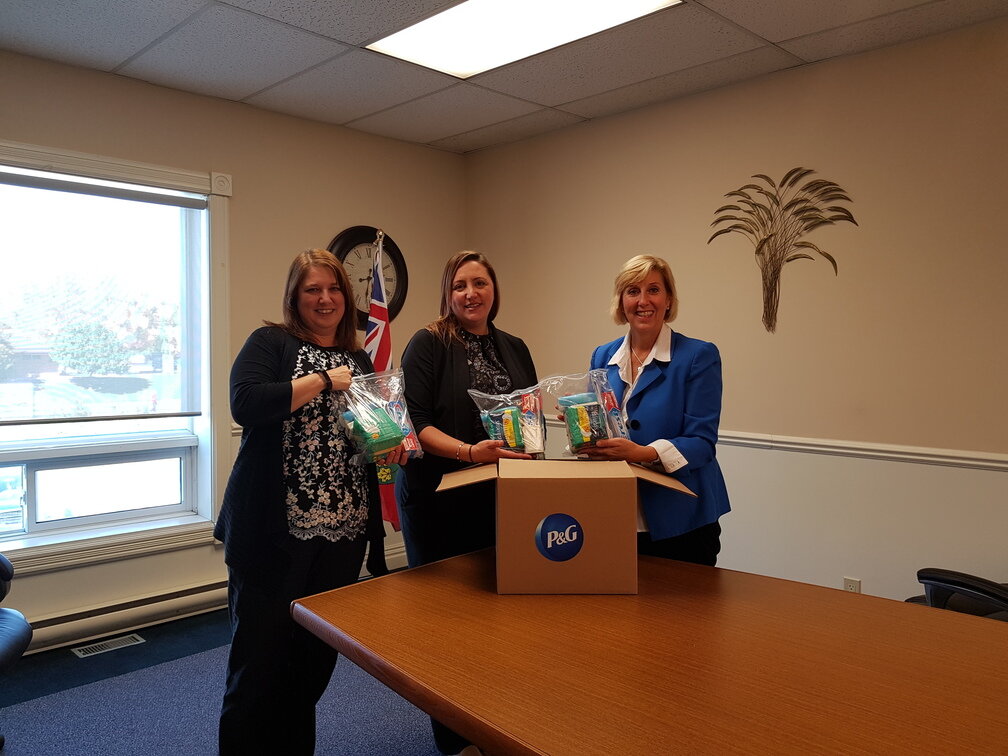 Scott presents shelter kits to local groups