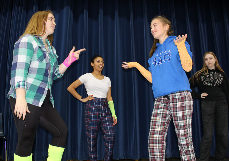 The cast rehearses for the main event. Photo: St. Thomas Aquinas.