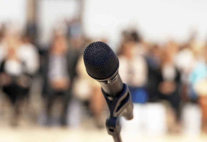 Microphone in front of a crowd